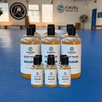 Six bottles of Kimura Soap Co. Tea Tree + Mint body wash, 16 oz and 3 oz 6-pack