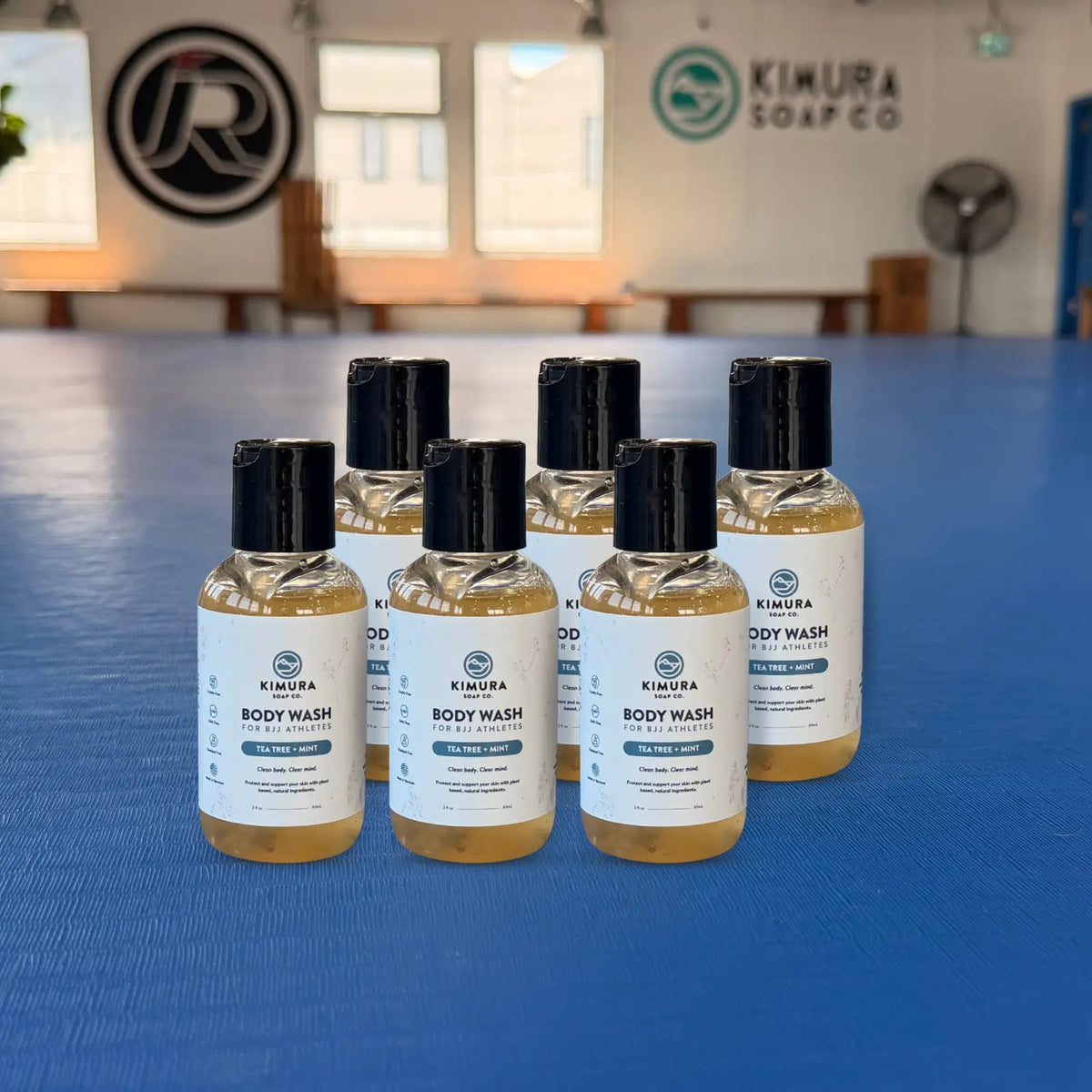 Six small bottles of Kimura Soap Co. body wash